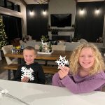 Jeni Nussbaum – kids Avery and Cohen making paper snowflakes